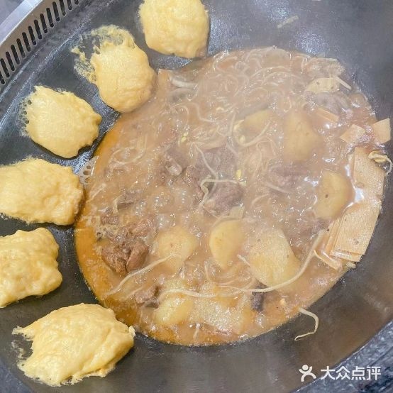 东北特色铁锅炖人(曙光北路店)
