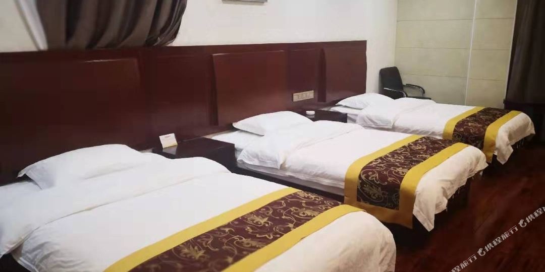 山南褰锦砻商务酒店