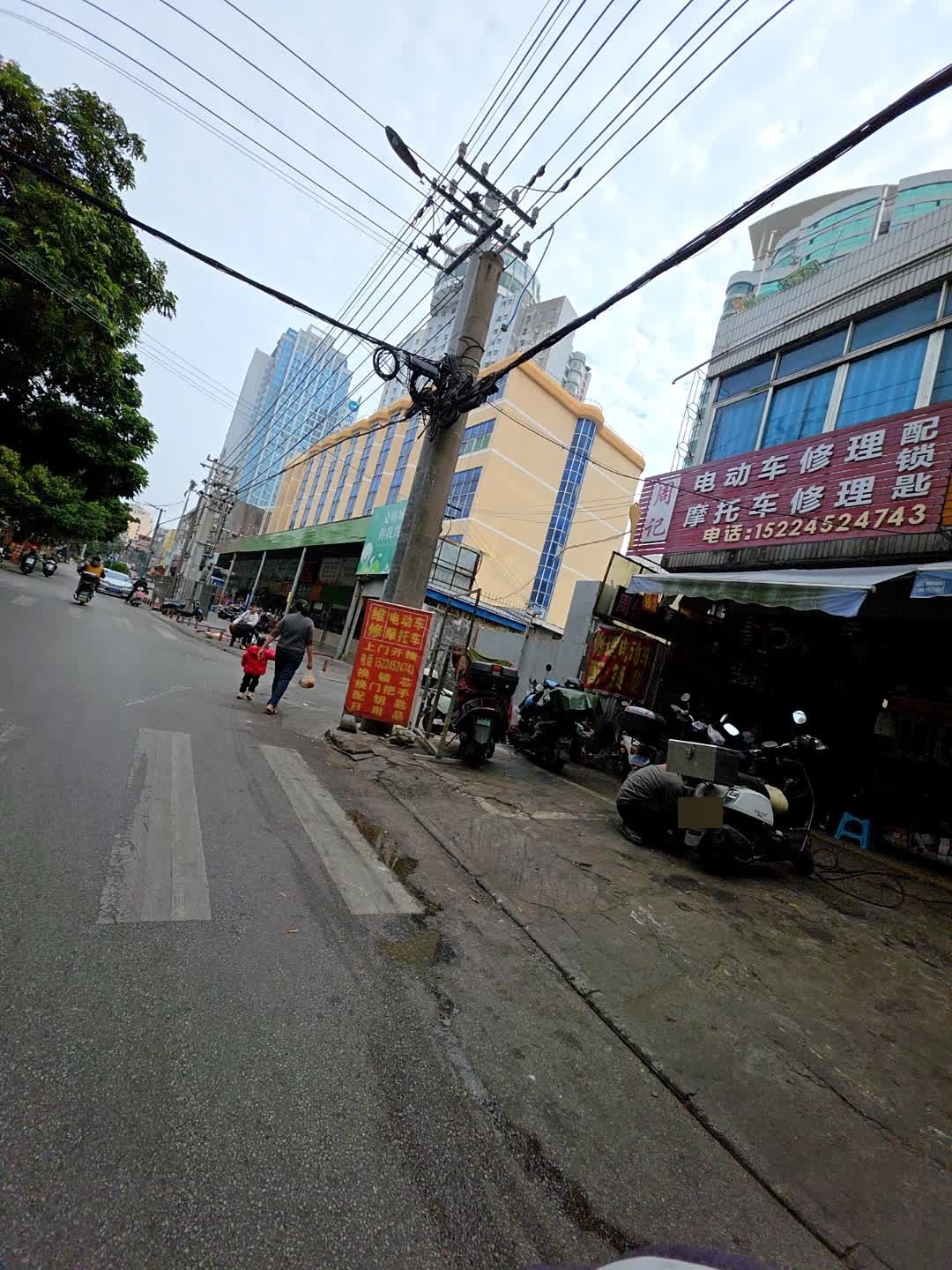 周记电动车摩托车修理