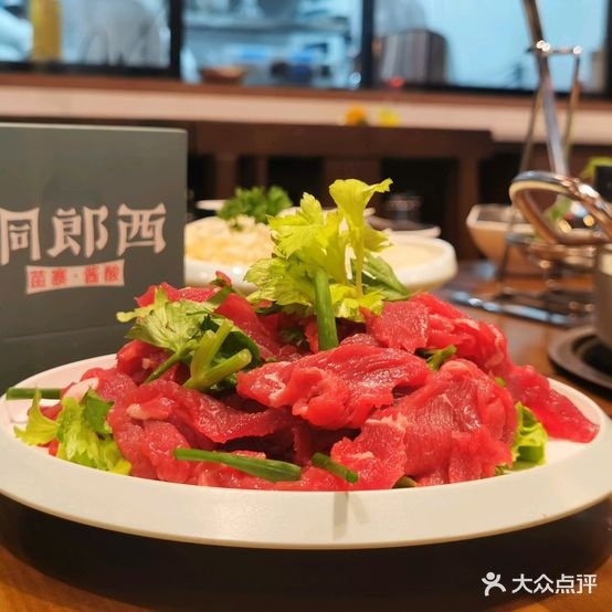 侗狼西苗寨酱酸火锅店(贵州金融城店)