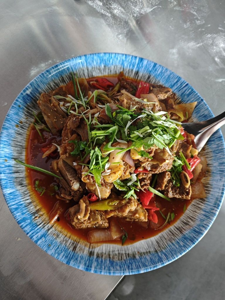 清真鸣沙阁小田宁夏海原特色炒肉片