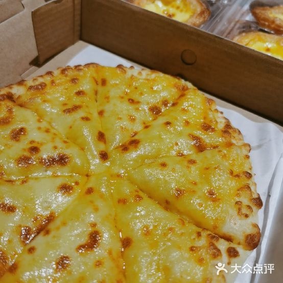 先什榴生蓊披萨店