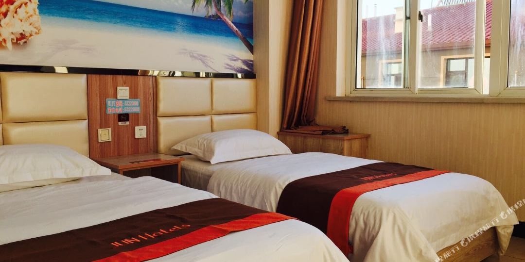 橙客连锁酒店兴城浪漫假日快捷宾馆店